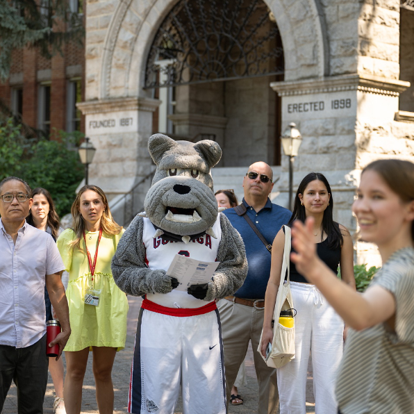 First-year students participate in the Welcome Walk during Orientation Weekend.